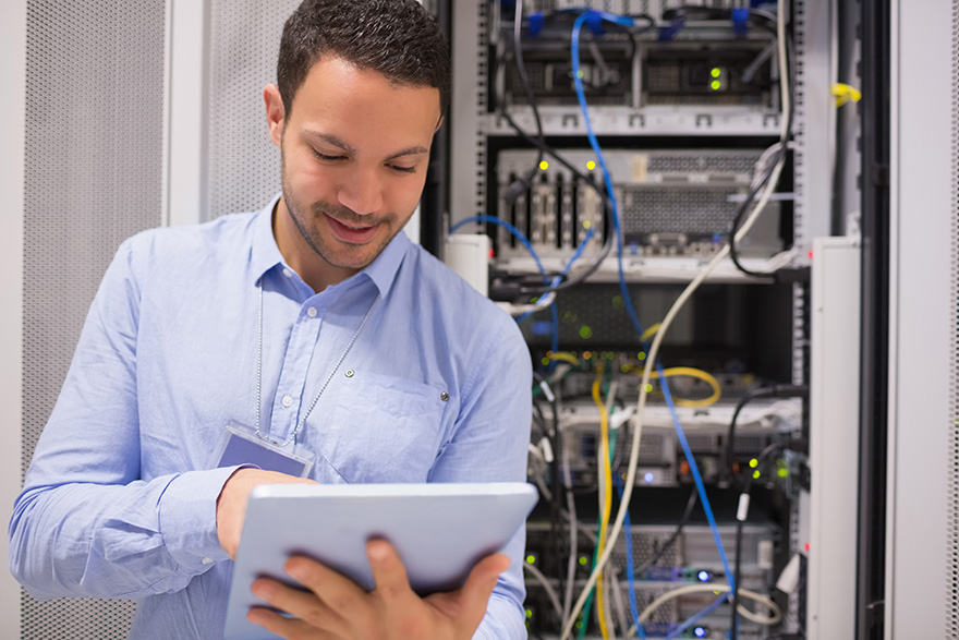 an engineer works with a circuit board