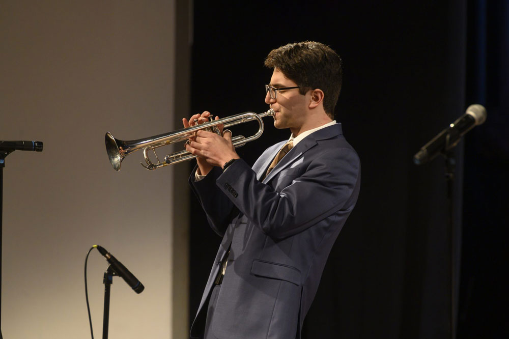 a jazz studies student plays the trumpet