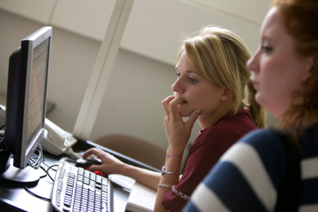 two students using a computer